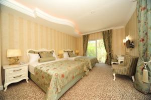 Postel nebo postele na pokoji v ubytování Grand Gocek Hotel + 37 fotografií