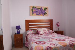 Posteľ alebo postele v izbe v ubytovaní Apartamento para 2 en la segunda planta + 8 fotografií