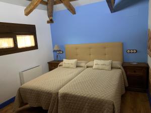 Postel nebo postele na pokoji v ubytování Casa Rural La Tia Lola