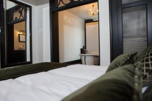 Rúm í herbergi á B in Antwerp