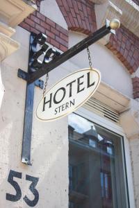 Ein Zertifikat, Auszeichnung, Logo oder anderes Dokument, das in der Unterkunft Hotel Stern ausgestellt ist