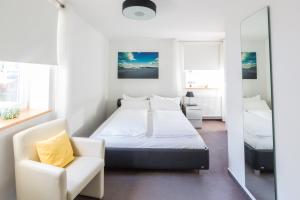 Ein Bett oder Betten in einem Zimmer der Unterkunft Hotel und Restaurant Zeus