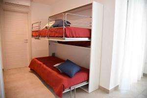 Katil atau katil-katil dalam bilik di Albachiara Residence