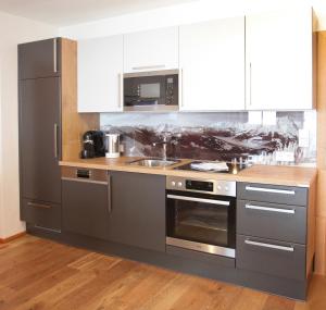 Kuchyňa alebo kuchynka v ubytovaní Tarlack Appartements Hütten 34