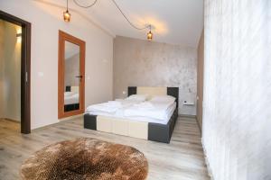 Ένα ή περισσότερα κρεβάτια σε δωμάτιο στο Апартаменти Принц и Принцеса