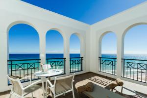 a room with a view of the ocean at Royal Palm Resort & Spa - Adults Only in Playa Jandia