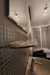 Kylpyhuone majoituspaikassa Bedrooms Ninfa Del Lago