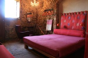 Een bed of bedden in een kamer bij Case di Vetulonia