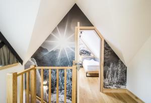 Posteľ alebo postele v izbe v ubytovaní Mountain Apartments Jagiellońska Residence