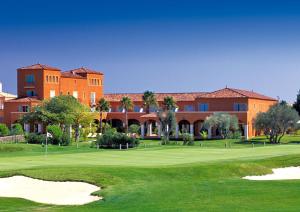 a view of the golf course at a resort at Palmyra Golf Hotel & Spa in Cap d'Agde