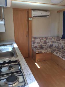 Kuchyň nebo kuchyňský kout v ubytování Camping Verde