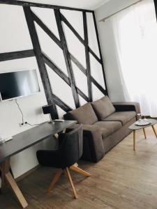 Ein Sitzbereich in der Unterkunft Altstadt Hotel Glockenhof