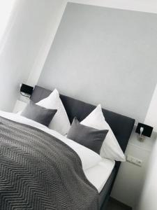 Ein Bett oder Betten in einem Zimmer der Unterkunft Altstadt Hotel Glockenhof