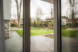 Vonkajšia záhrada v ubytovaní Mountain Apartments Jagiellońska Residence