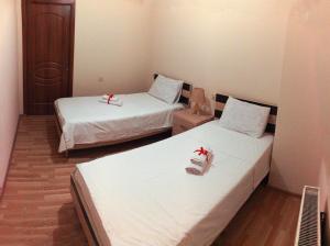 Postel nebo postele na pokoji v ubytování Hotel Tao