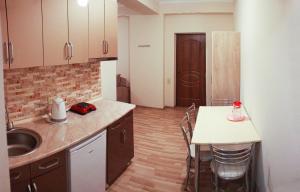 Kuchyň nebo kuchyňský kout v ubytování Hotel Tao