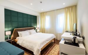 Hotel Gradska Cetinje客房内的一张或多张床位