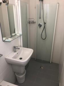 a bathroom with a sink and a shower at Hotel Marlisa Pier in Lido di Jesolo