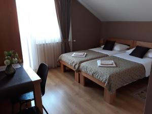 Postel nebo postele na pokoji v ubytování House Zlatko