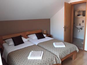 Postel nebo postele na pokoji v ubytování House Zlatko