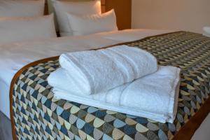Postel nebo postele na pokoji v ubytování Walhalla Hotel Regensburg Hoeferer 4 Sterne Superior
