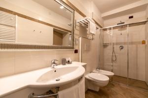 Kúpeľňa v ubytovaní Hotel Isolabella Wellness