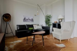 A seating area at Standard Apartment by Hi5 - Incredible view with terrace