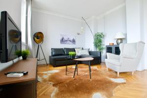 A television and/or entertainment centre at Standard Apartment by Hi5 - Incredible view with terrace