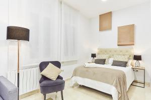 Postel nebo postele na pokoji v ubytování LEEWAYS APARTMENT IX in GRAN VÍA