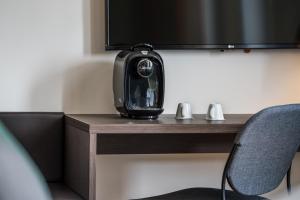 Příslušenství pro přípravu čaje a kávy v ubytování Quality Hotel Pond