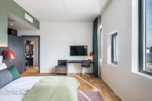 TV a/nebo společenská místnost v ubytování Quality Hotel Pond