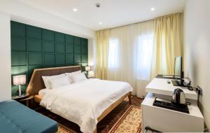 Hotel Gradska Cetinje客房内的一张或多张床位