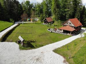 an aerial view of a farm with a house at Estate Marjetin dom in Idrija