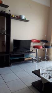 TV a/nebo společenská místnost v ubytování Gakis