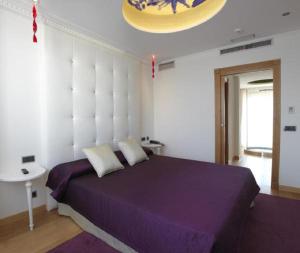 Postel nebo postele na pokoji v ubytování Hotel Campoamor