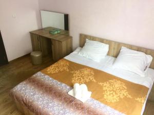 Letto o letti in una camera di Ana House