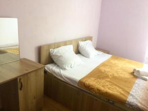 Letto o letti in una camera di Ana House