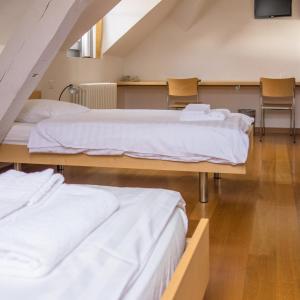 Postel nebo postele na pokoji v ubytování Château de Bossey