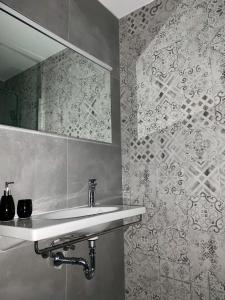 Koupelna v ubytování Deluxe Suites Mandić + 37 fotografií