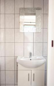 Ένα μπάνιο στο Kelzane Self-Catering