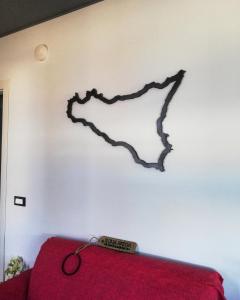 A bed or beds in a room at Sicilia Bedda B&B