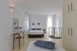 Ένα ή περισσότερα κρεβάτια σε δωμάτιο στο Tonia Apartments Paros