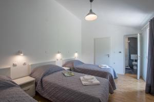 Postel nebo postele na pokoji v ubytování Villa Mira + 37 fotografií