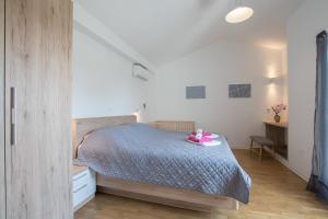 Postel nebo postele na pokoji v ubytování Villa Mira