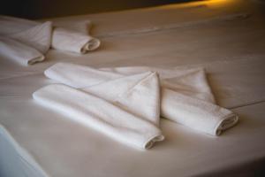 Postel nebo postele na pokoji v ubytování Prince Cyril Hotel