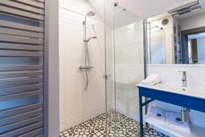 a bathroom with a shower and a sink at Villa Testa in Sopot +23 photos