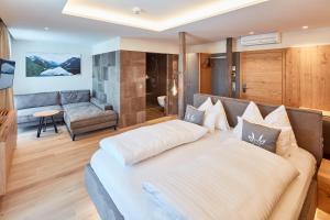 Łóżko lub łóżka w pokoju w obiekcie Hotel Gerl