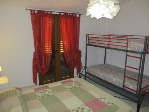 Posteľ alebo postele v izbe v ubytovaní SoleMare Sud Sardegna