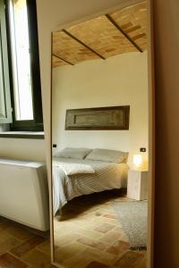 Tempat tidur dalam kamar di Frontemaja