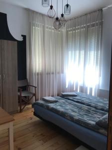 A bed or beds in a room at 21 Han Asparuh - 24h Self Check-in